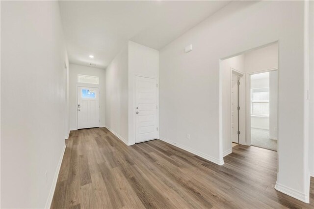 foyer entrance with light wood-type flooring