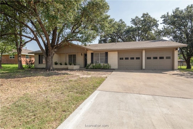 ranch-style home with a garage