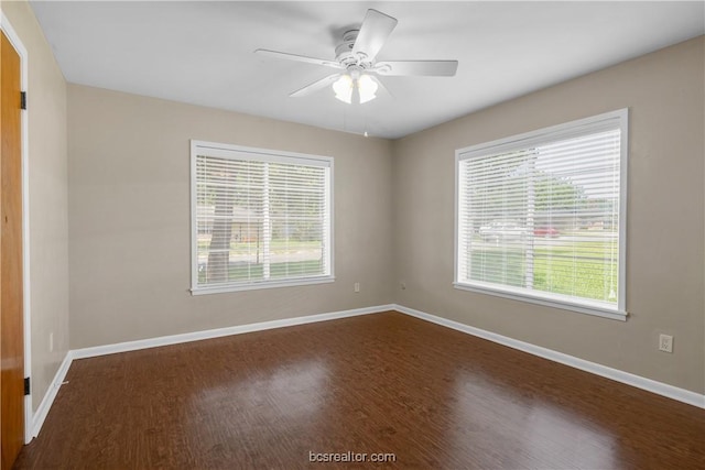 unfurnished room featuring hardwood / wood-style flooring, ceiling fan, and a healthy amount of sunlight