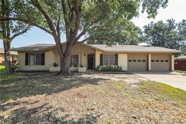 single story home featuring a garage