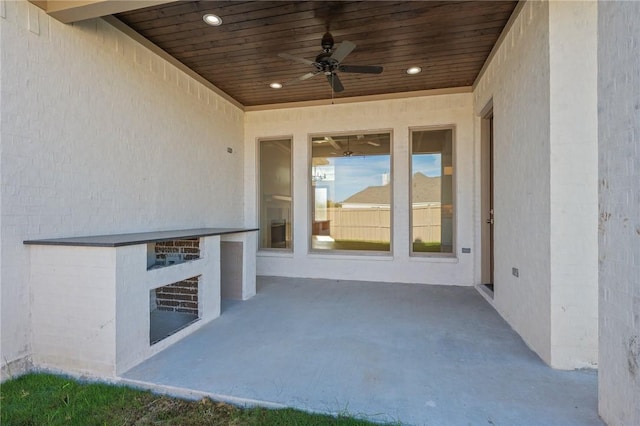 view of patio / terrace featuring ceiling fan