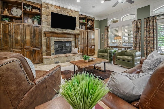 4920 Whistling Straits Loop, College Station, TX 77845 - living area featuring ornamental molding, a ceiling fan, a stone fireplace, carpet, and recessed lighting