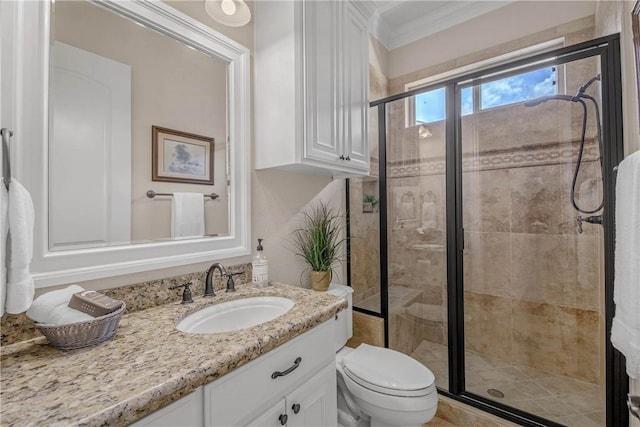 4920 Whistling Straits Loop, College Station, TX 77845 - bathroom featuring a shower stall, vanity, and ornamental molding