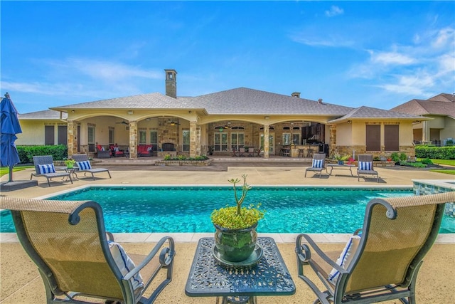 4920 Whistling Straits Loop, College Station, TX 77845 - swimming pool featuring a patio, a ceiling fan, and a water slide