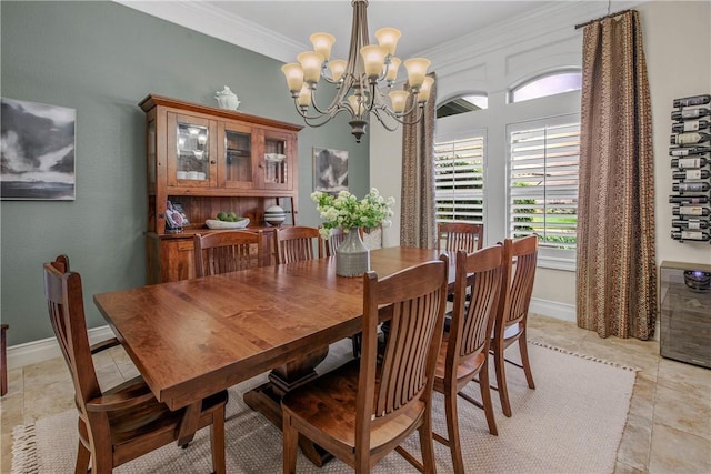 4920 Whistling Straits Loop, College Station, TX 77845 - dining area featuring crown molding, a chandelier, and light tile patterned flooring
