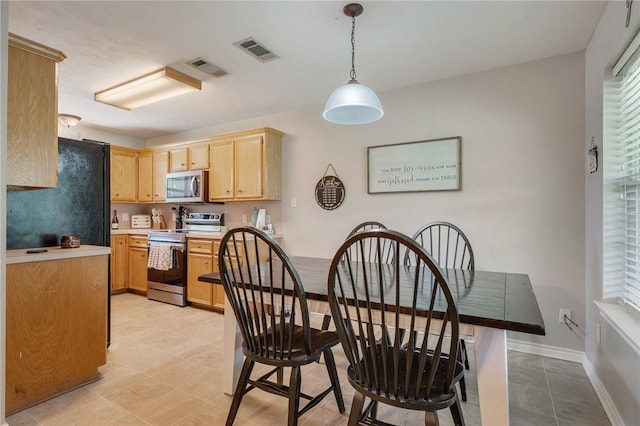 7314 Dilly Shaw Tap Rd, Bryan, TX 77808 - dining space with plenty of natural light and baseboards