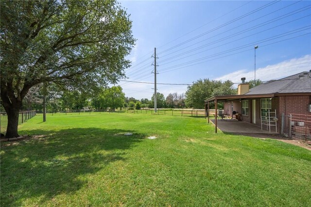 7314 Dilly Shaw Tap Rd, Bryan, TX 77808 - view of yard with a patio