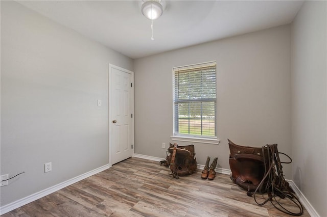 7314 Dilly Shaw Tap Rd, Bryan, TX 77808 - sitting room with wood finished floors and baseboards