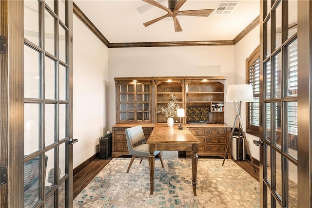 office space featuring visible vents, french doors, crown molding, and a ceiling fan