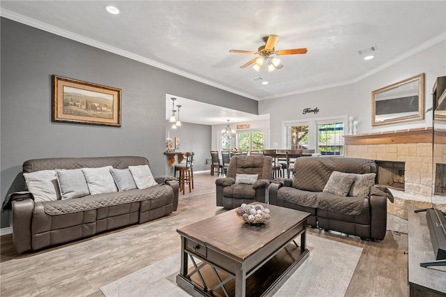 912 Emerald Dove Ave, College Station, TX 77845 - living area featuring a chandelier, recessed lighting, a ceiling fan, light wood-style flooring, and ornamental molding