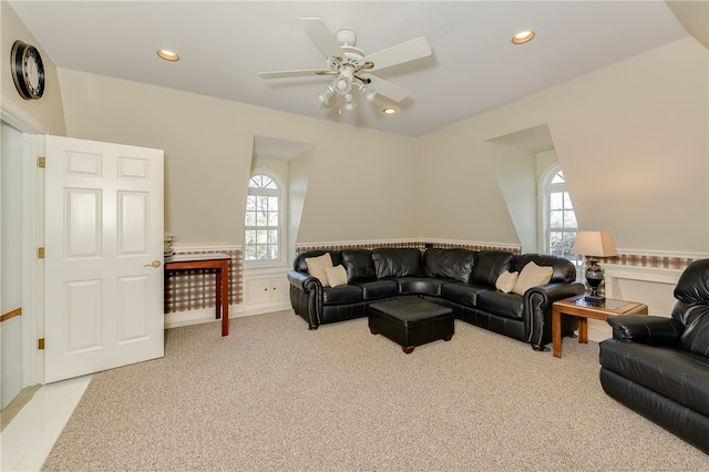 living area with a ceiling fan, recessed lighting, wainscoting, and light colored carpet