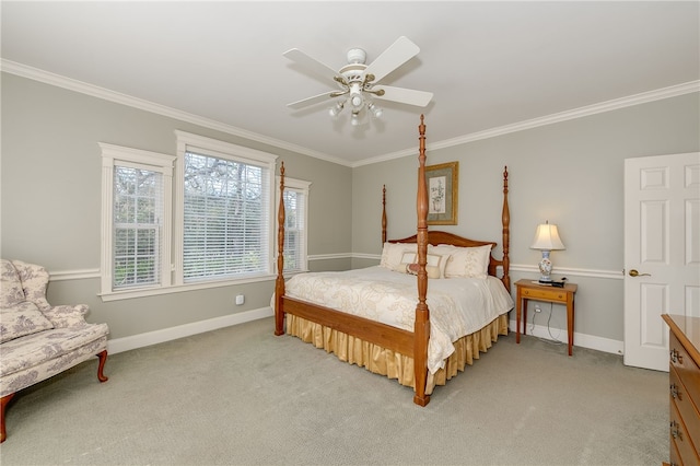 bedroom featuring a ceiling fan, light carpet, crown molding, and baseboards