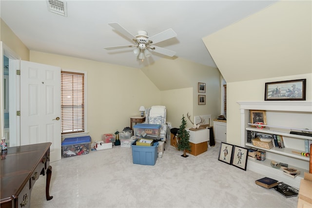 bonus room with lofted ceiling, visible vents, carpet floors, and ceiling fan