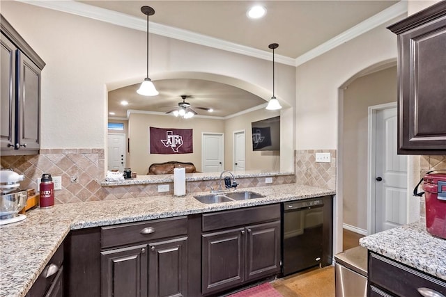 kitchen featuring sink, decorative light fixtures, dishwasher, and dark brown cabinetry