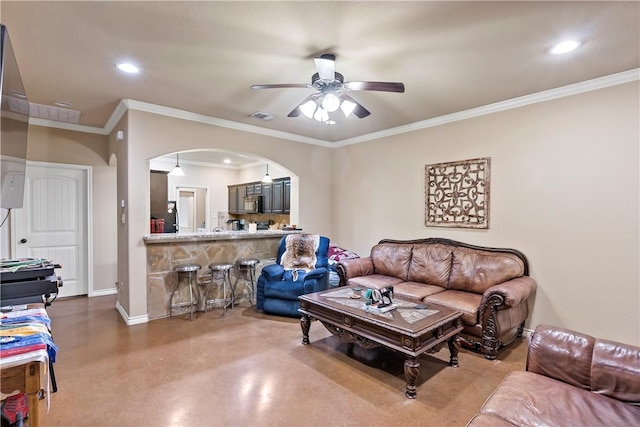 living room with concrete floors, ceiling fan, and crown molding