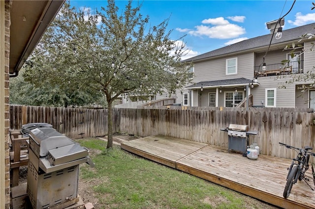 wooden deck with area for grilling