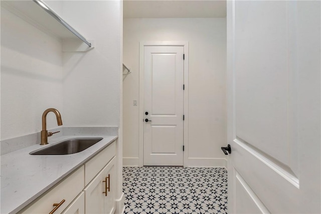 laundry area with sink