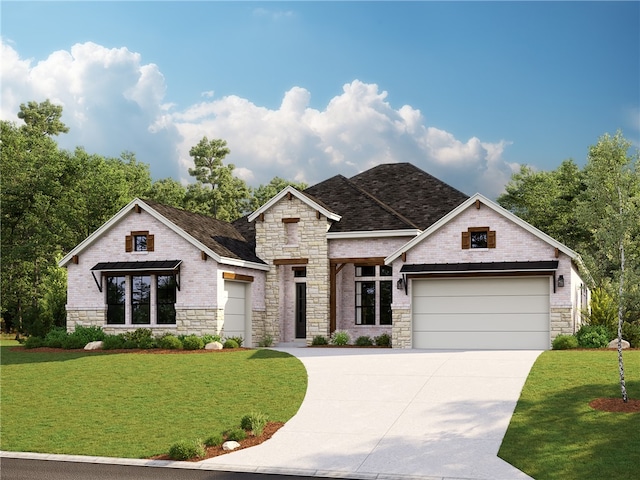 view of front of home with a garage and a front lawn