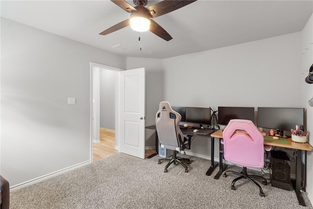 2072 Chief St, Bryan, TX 77807 - carpeted home office with a ceiling fan and baseboards