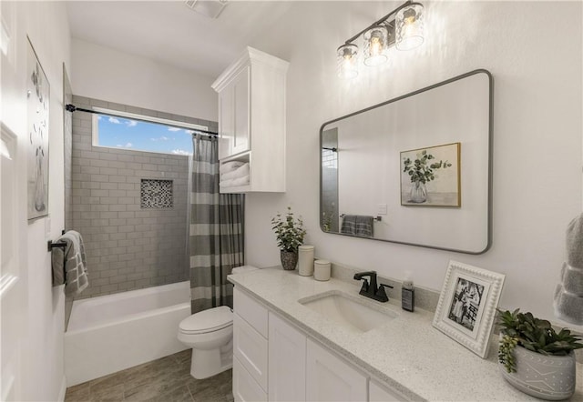 full bathroom with tile patterned floors, vanity, toilet, and shower / bathtub combination with curtain