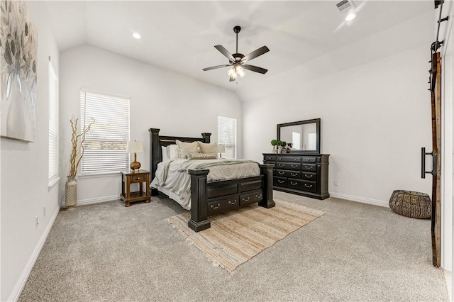 carpeted bedroom featuring ceiling fan and lofted ceiling