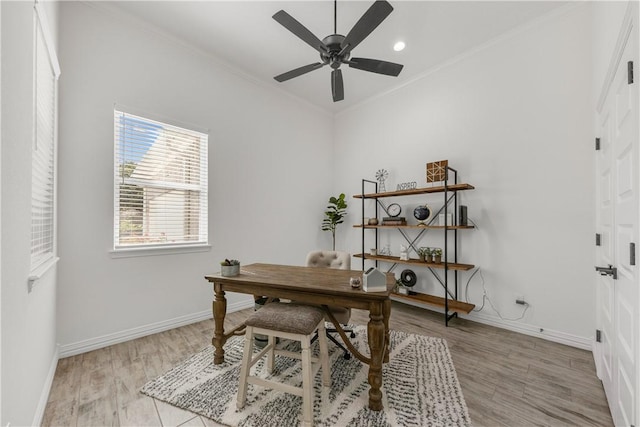 office area with ceiling fan, light hardwood / wood-style flooring, and ornamental molding