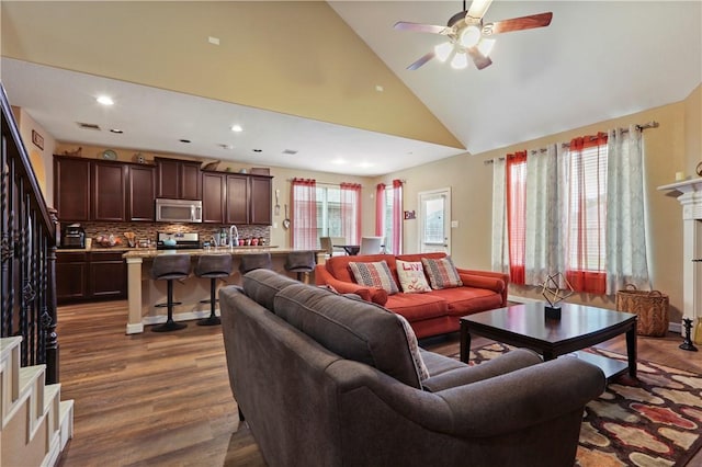 13423 Ashley Acres Ln, Cypress, TX 77429 - living area with dark wood finished floors, a ceiling fan, recessed lighting, and high vaulted ceiling