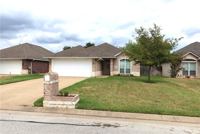 ranch-style house with a garage and a front lawn