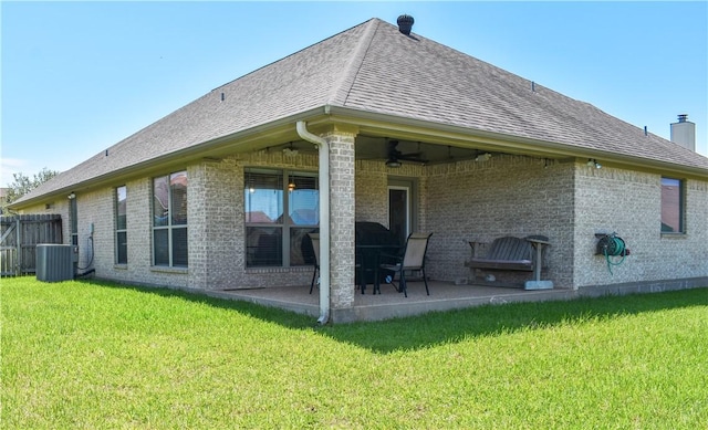 3310 Keefer Loop, College Station, TX 77845 - back of house featuring a ceiling fan, a patio, central air condition unit, brick siding, and roof with shingles