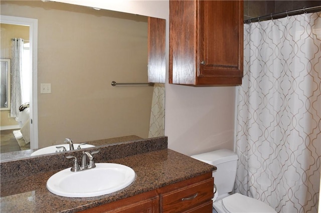 3310 Keefer Loop, College Station, TX 77845 - bathroom with vanity, toilet, and curtained shower