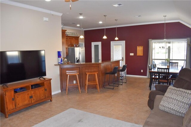 3310 Keefer Loop, College Station, TX 77845 - living area with baseboards, light tile patterned flooring, recessed lighting, crown molding, and a ceiling fan