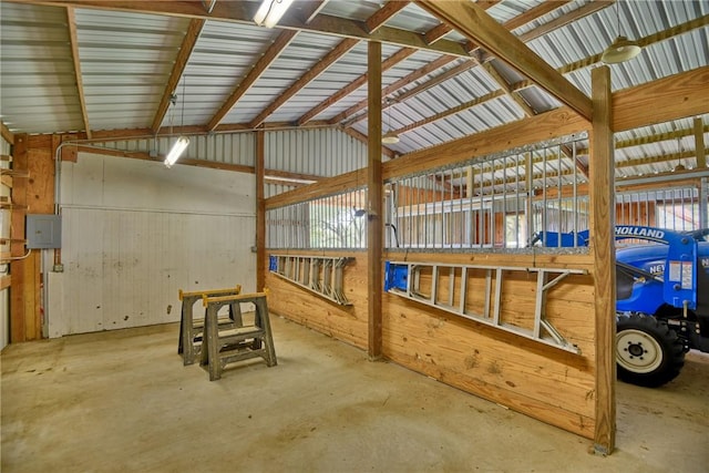 view of horse barn with electric panel