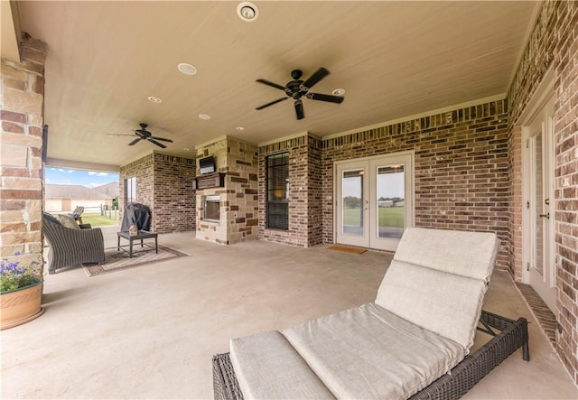 6997 Shirley Rd, Bryan, TX 77808 - view of patio with ceiling fan and french doors