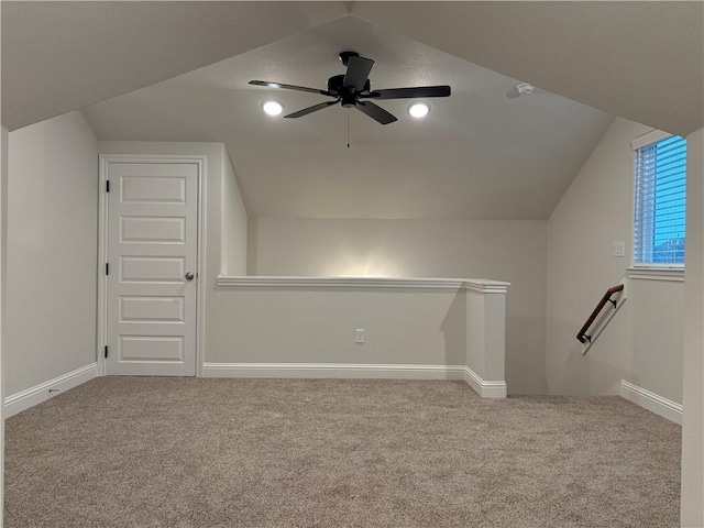 bonus room with carpet, ceiling fan, and vaulted ceiling