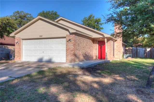 1307 Hardwood Ln, College Station, TX 77840 - ranch-style house featuring an attached garage, brick siding, concrete driveway, and a chimney
