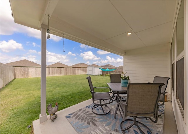 2412 Divot Ln, Navasota, TX 77868 - view of patio featuring outdoor dining area