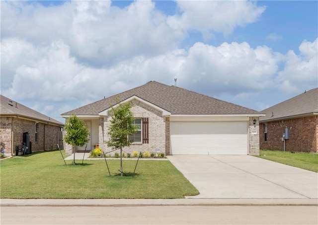 2412 Divot Ln, Navasota, TX 77868 - ranch-style house with an attached garage, concrete driveway, a front yard, and brick siding