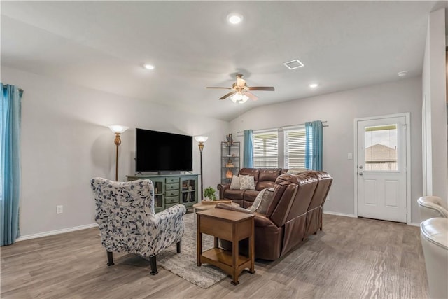 2412 Divot Ln, Navasota, TX 77868 - living area with light wood-style flooring, ceiling fan, baseboards, vaulted ceiling, and recessed lighting