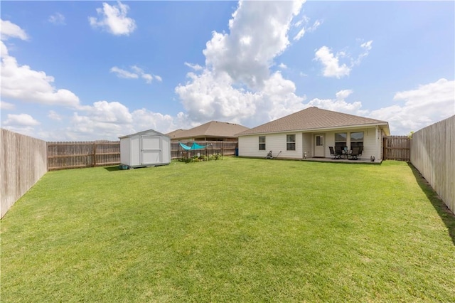 2412 Divot Ln, Navasota, TX 77868 - rear view of house featuring a patio
