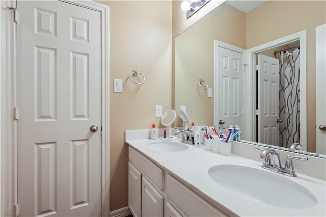 bathroom featuring vanity