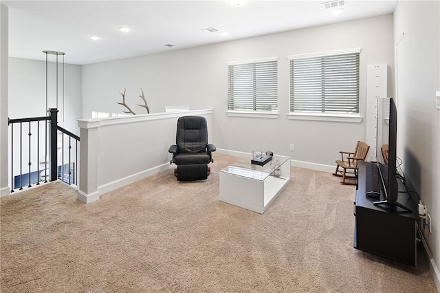 sitting room with recessed lighting, visible vents, an upstairs landing, baseboards, and carpet