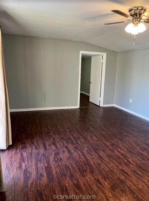 unfurnished room featuring dark hardwood / wood-style flooring and ceiling fan