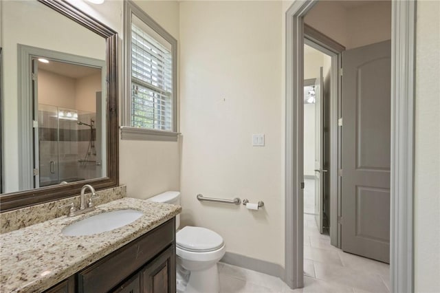 5217 Ruddy Duck Dr, College Station, TX 77845 - bathroom with a stall shower, vanity, and tile patterned flooring