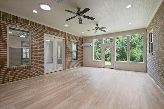 5217 Ruddy Duck Dr, College Station, TX 77845 - unfurnished sunroom with french doors and a wall mounted air conditioner
