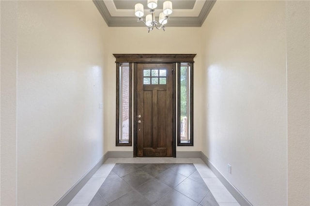 5217 Ruddy Duck Dr, College Station, TX 77845 - entryway with crown molding, a chandelier, and tile patterned floors