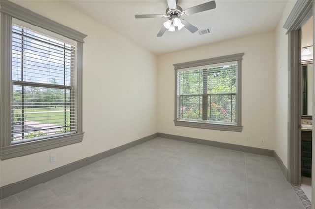 5217 Ruddy Duck Dr, College Station, TX 77845 - spare room with baseboards and ceiling fan