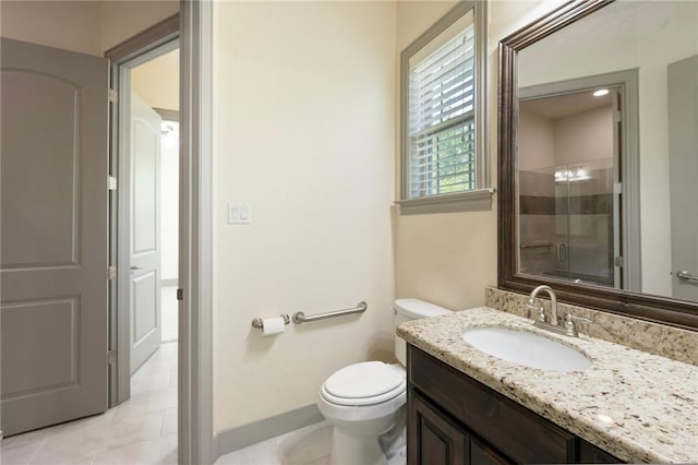 5217 Ruddy Duck Dr, College Station, TX 77845 - bathroom featuring vanity, tile patterned floors, and an enclosed shower