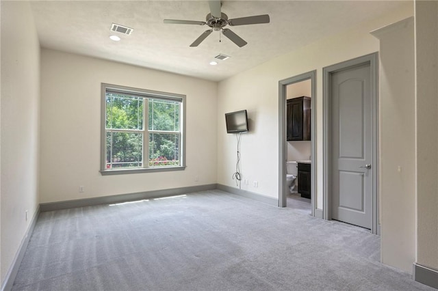 5217 Ruddy Duck Dr, College Station, TX 77845 - unfurnished bedroom with light colored carpet, recessed lighting, a ceiling fan, and ensuite bathroom