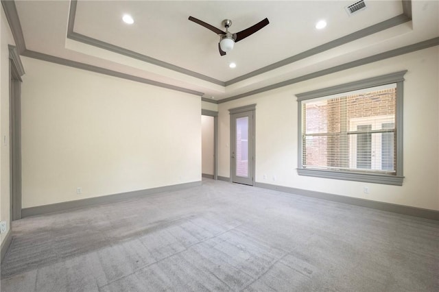 5217 Ruddy Duck Dr, College Station, TX 77845 - carpeted empty room featuring a tray ceiling, ceiling fan, crown molding, and recessed lighting