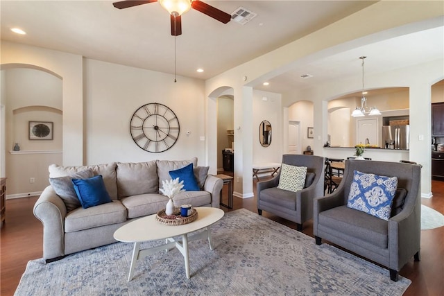4205 Cripple Creek Ct, College Station, TX 77845 - living room with arched walkways, wood finished floors, ceiling fan, and recessed lighting